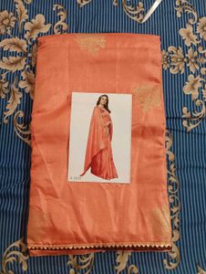 Elegant Peach Saree with Golden Floral Motifs