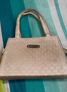 Elegant Beige Textured Handbag