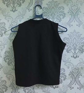 Sleeveless Black Top with White Stripes