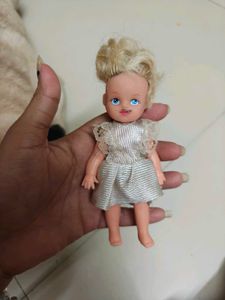 Vintage Doll with Silver Dress