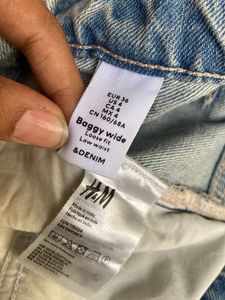 Distressed Light Wash mid rise Wide Leg Jeans