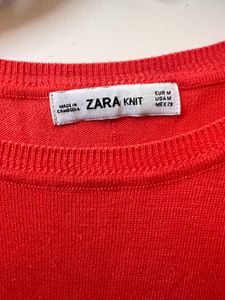 Zara's Thin Orange Sweater
