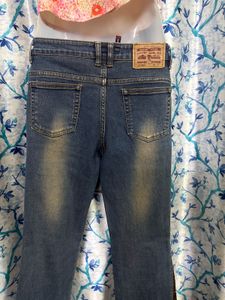 Vintage Flare Jeans with grommets and leather Pane