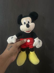 Mickey Mouse plush toy, resembling the classic