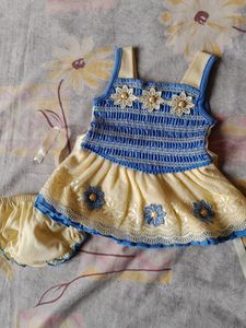 beautiful baby frock blue and cream. Never used.
