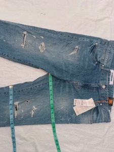 Distressed Denim Jeans