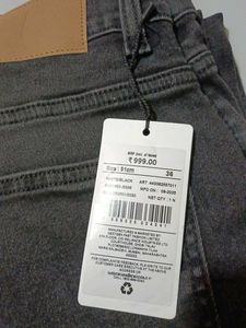 Distressed Black Jeans with Star Detail