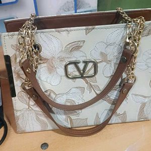 Elegant Floral Handbag with Gold Chain Strap