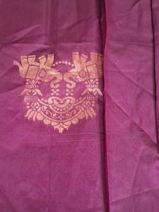 Elegant Maroon Saree with Intricate Designs