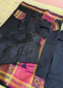 Elegant Black Saree with Pink Border