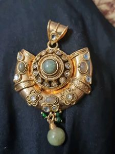 Designer Gold Tone Pendant with Green Stones