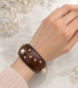 Elegant Wooden Pearl Bracelet