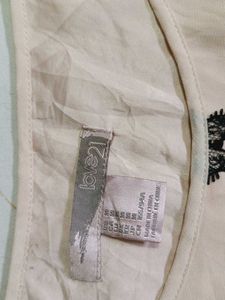 Elegant Beige High-Low Dress with Black Lace