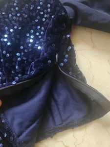 Sparkling Sequin Blouse with Ruffle Sleeves