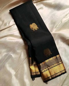 Elegant Black Saree with Gold Elephant Motif