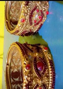 Elegant Gold and Ruby Bangle