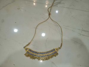 Elegant Gold Necklace with Blue Stones
