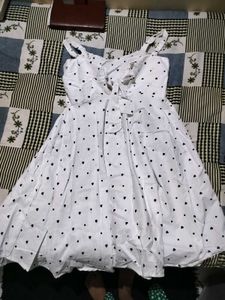 a cute bow short dress I got it from sarojini mark