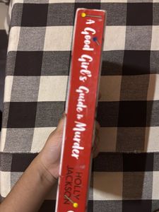 A Good Girl's Guide to Murder Book