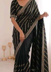Elegant Black & Gold Striped Saree