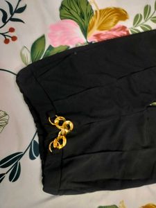 Aura Black Wide-Leg Pants with Gold Chain Detail
