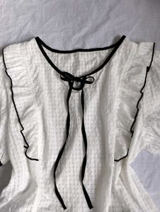 Chic White Puff Sleeve Top with Black Trim
