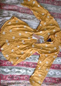 Yellow top with white polka dots