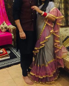 Elegant Grey Saree with Pink Ruffle Border