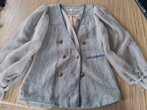 Chic Double-Breasted Blazer with Sheer Sleeves