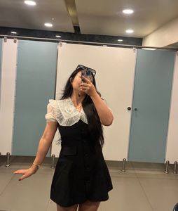 Chic Black Dress with Lace Collar