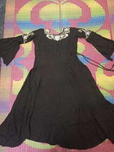 Embroidered gown with elegant pearl stone and embr