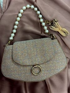 Shimmery Handbag with pearl chain