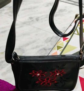 Chic Black Crossbody Bag with Floral Embroidery
