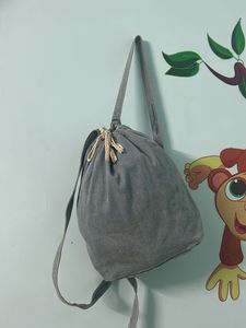 Drawstring Light Blue Denim Backpack