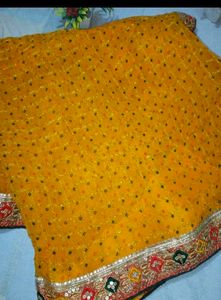 Vibrant Yellow Embellished Saree