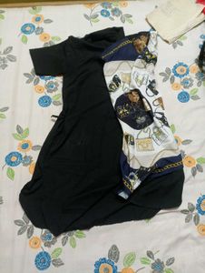 Elegant Black Dress with Scarf Detail