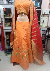Designer Orange Embroidered Lehenga Choli