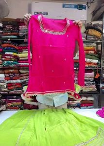 Vibrant Pink Kurta Set with Green Skirt