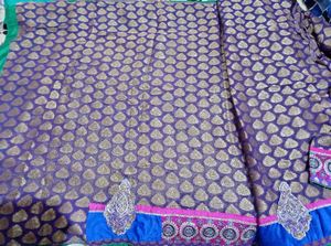 Royal Elegance Net Embroidered Saree with Blouse