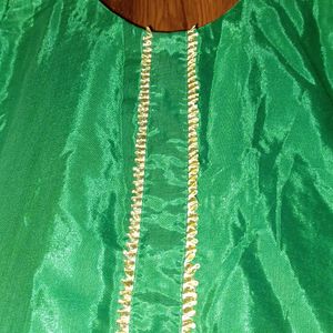 Green silk color kutra with lace in front. perfect for mending functions.  custom made..size 42.never worn