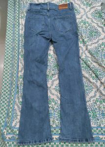 Ripped bellbottom jeans