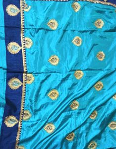 Beautiful Turquoise Saree with Gold Embroidery