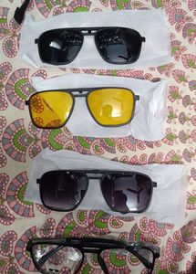 four pairs of eyewear laid