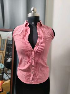 Sleeveless Pink Button-Up shirt