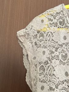 Net Jumpsuit With Bottons In Front To Open
