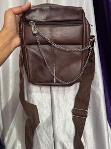 brown sling bag