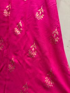 Vibrant Pink Saree with Gold Print