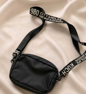 Savana Chic Black Crossbody Bag with Butterfly Acc