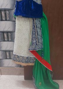 off white saree with green pallu