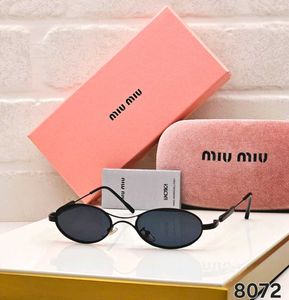 Miu Mi Oval Sunglasses